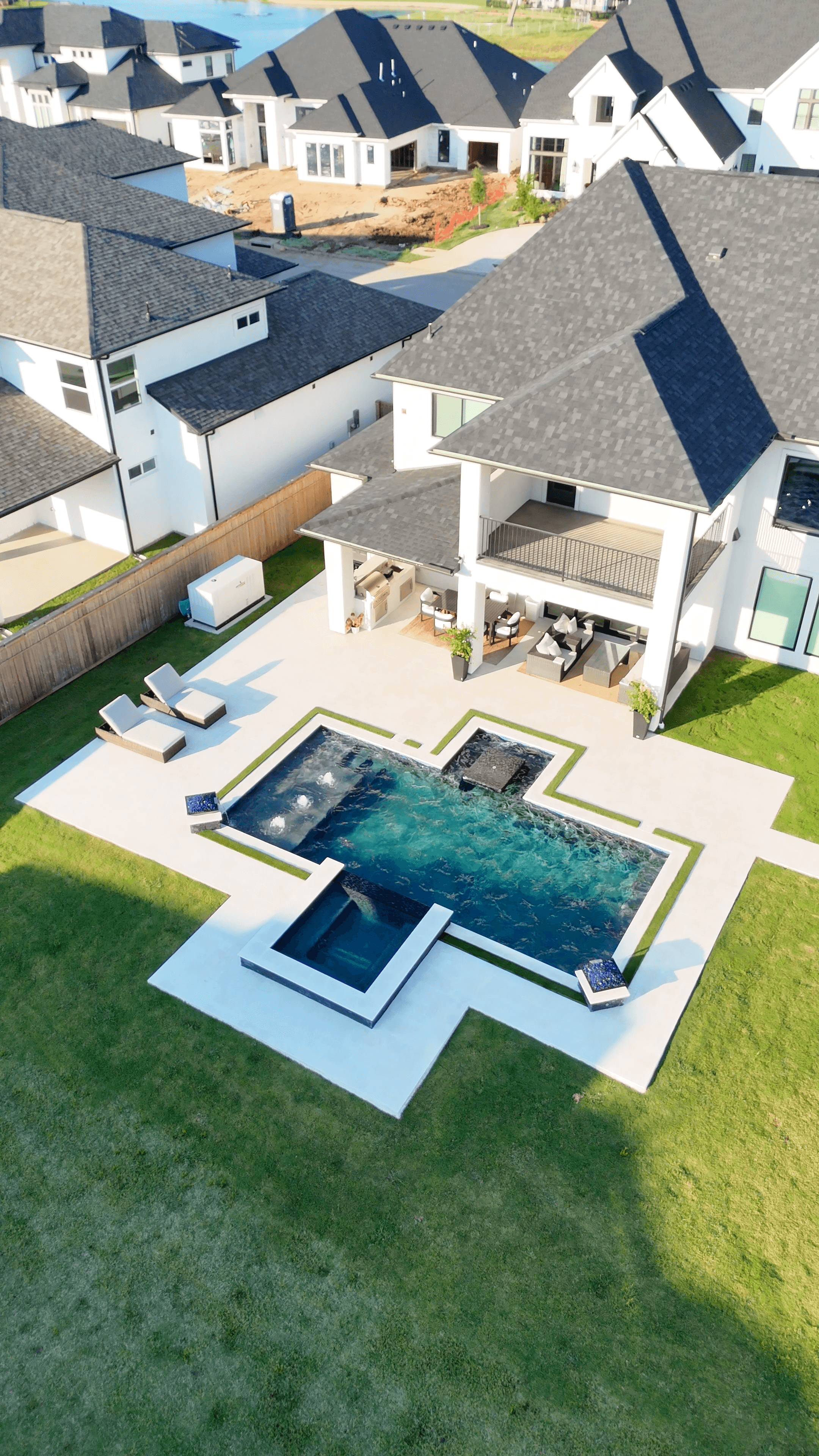 Luxury custom pool design and outdoor living space in Houston