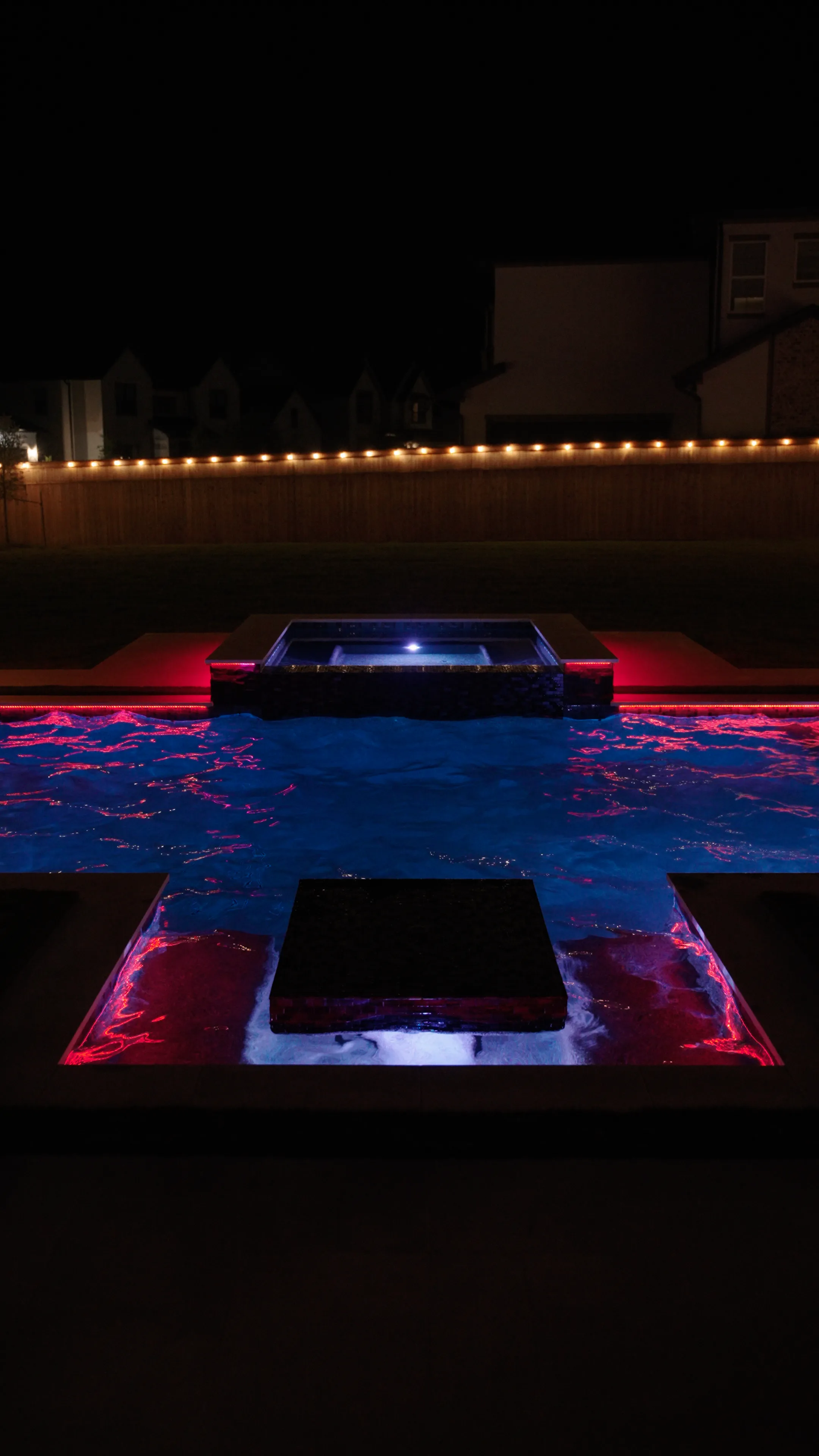 High-end custom gunite pool with integrated outdoor living space in the Houston area